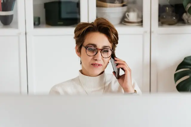 cheerful woman talking on the phone