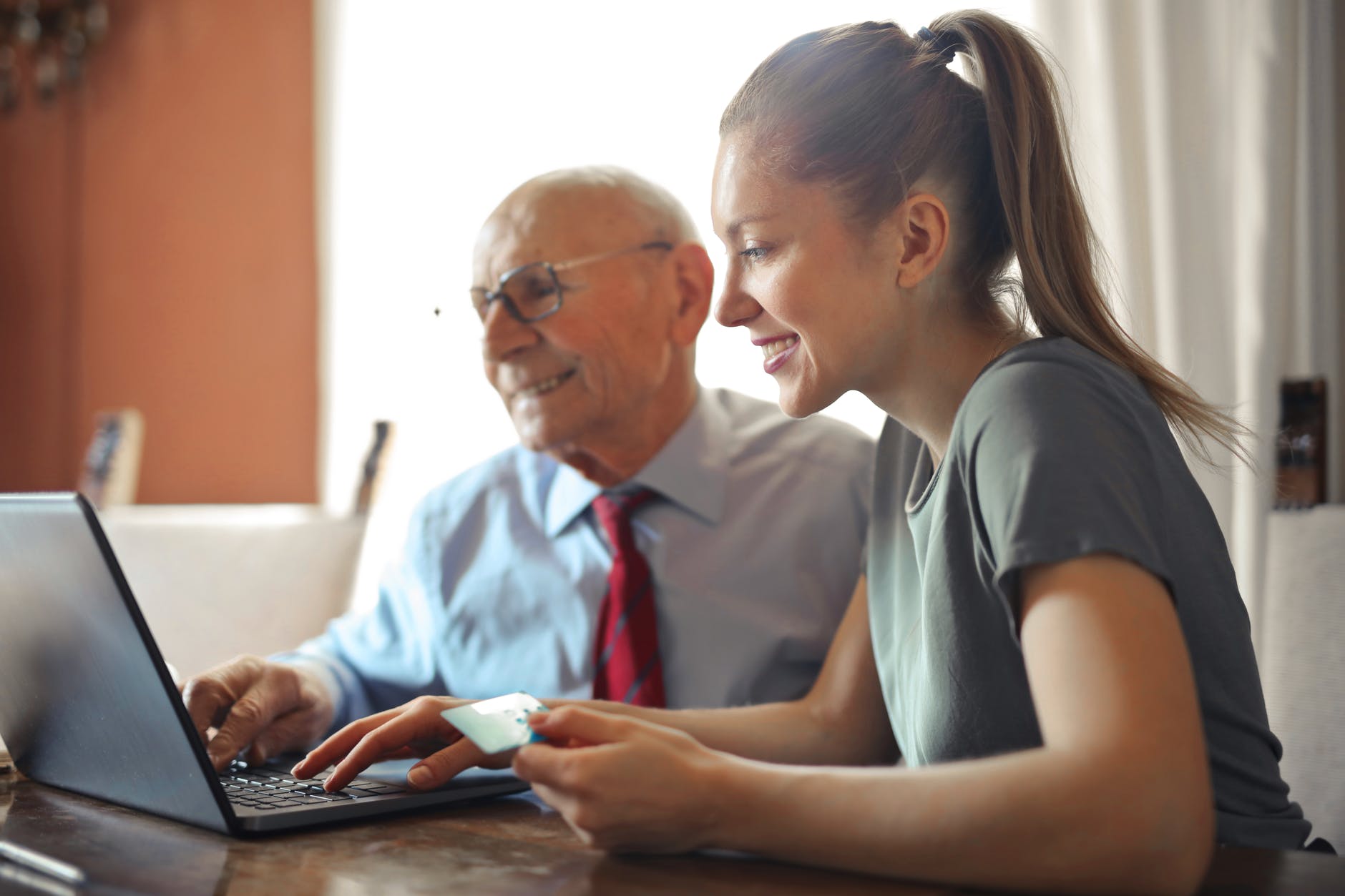 Father and daughter discussing finances 